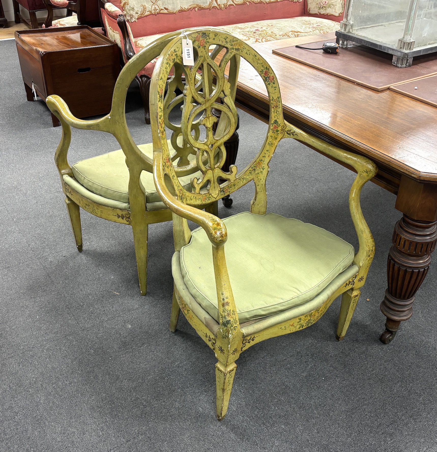 A set of four late 18th century Continental green painted elbow chairs, width 62cm, depth 50cm, height 100cm